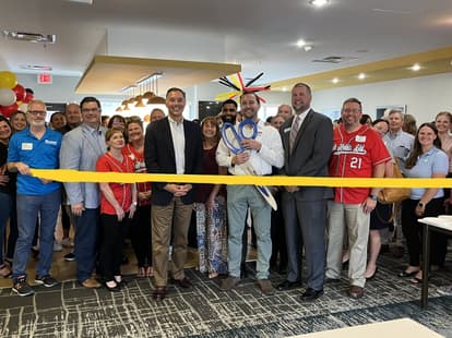 Hotel ceremony grand reopening ribbon cutting