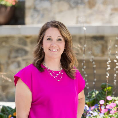Professional photo of Lindsay at Leadership Center Courtyard